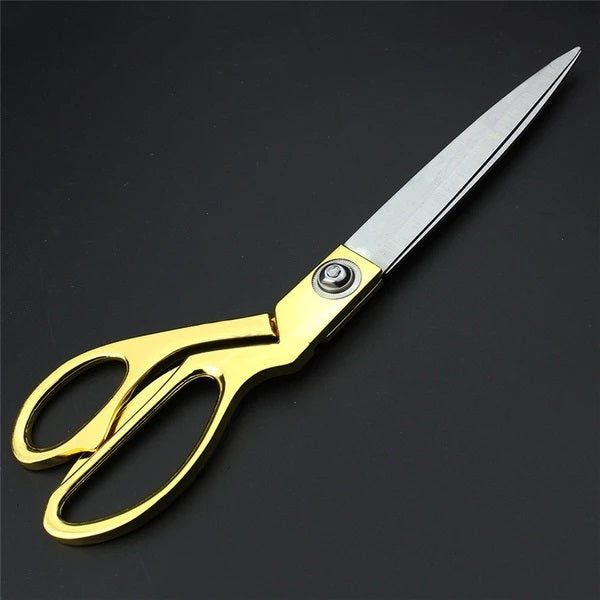 Sharp stainless steel tailoring scissors for professional use. Sharp stainless steel tailoring scissors for professional use.